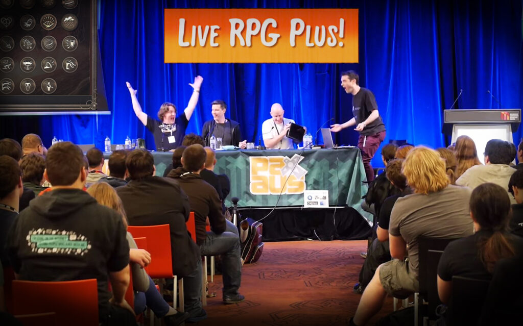A photo of an amazing moment in a Dicestormers live show at PaxAUS. Murray rolls a Natural 20